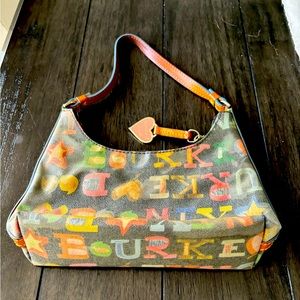 Dooney and Bourke tiny purse with rainbow zipper great condition!
